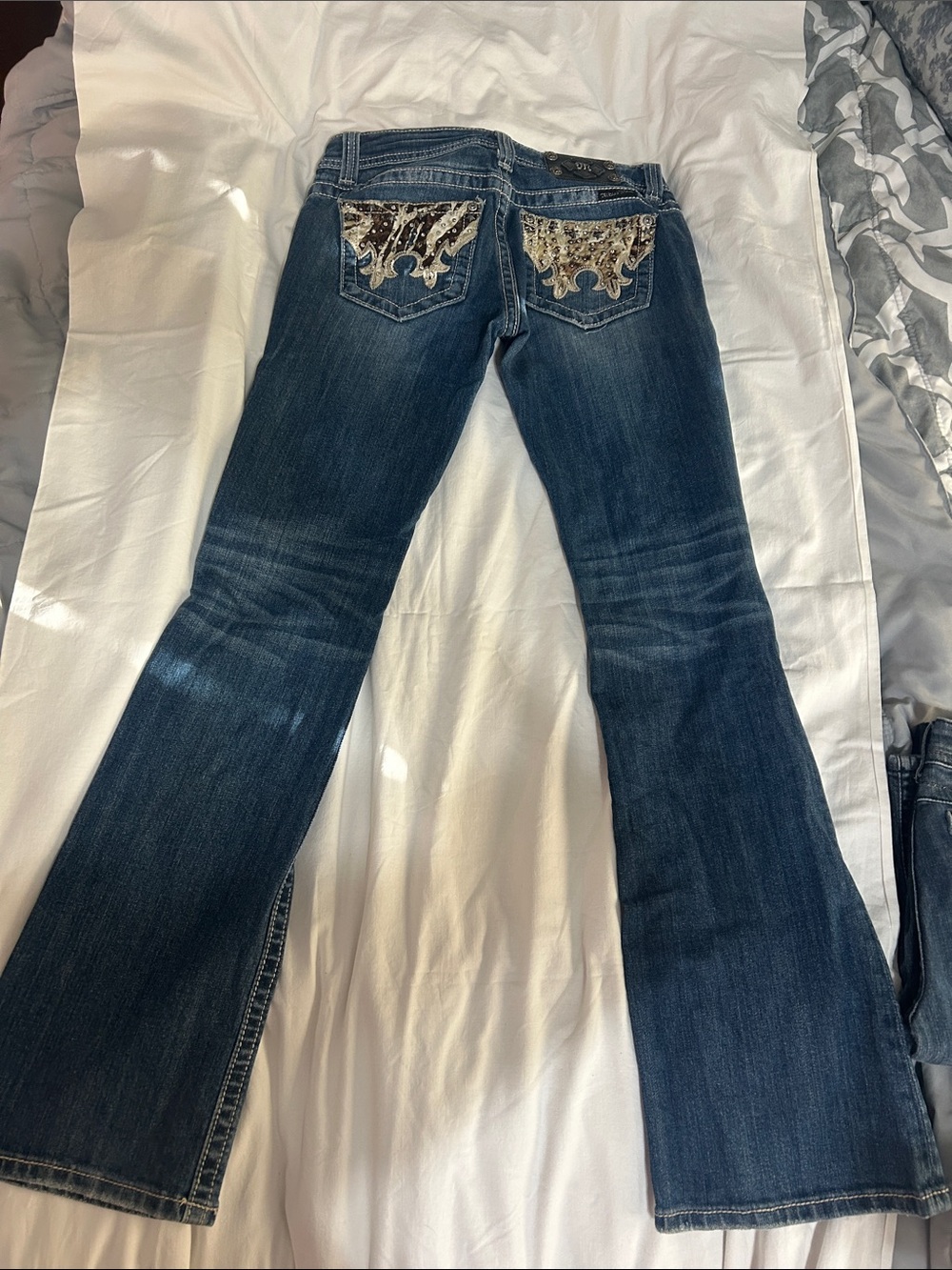 Dark Blue Women's Flare Jeans with Embellished Back Pockets